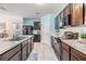 Well-equipped kitchen with stainless steel appliances and a bright, airy atmosphere at 3876 Crossline Dr, Spring Hill, FL 34609