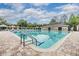 Community pool featuring a lap lane, and plenty of chairs to relax around the pool at 3876 Crossline Dr, Spring Hill, FL 34609