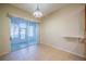 Cozy dining area with a sliding door leading to the screened-in patio at 445 Noble Faire Dr, Sun City Center, FL 33573