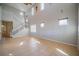 Open living area featuring high ceilings, plenty of windows, and tile floors at 445 Noble Faire Dr, Sun City Center, FL 33573