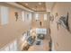 Comfortable living room with high ceilings, stylish furnishings, and lots of natural light at 445 Noble Faire Dr, Sun City Center, FL 33573