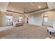 Large main bedroom includes a comfortable sitting area, neutral colors, and ensuite at 445 Noble Faire Dr, Sun City Center, FL 33573