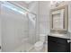 Well-lit bathroom featuring a glass shower, granite countertop vanity, and neutral wall colors at 4551 Barletta Ct, Wesley Chapel, FL 33543