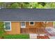 Charming home featuring a cozy front porch, perfect for enjoying the neighborhood views at 5042 8Th St, Zephyrhills, FL 33542