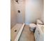 Bright bathroom with a tiled walk-in shower, modern sink and vanity at 6046 7Th Ave, New Port Richey, FL 34653