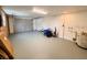 Spacious garage with ample room for storage and parking with a garage door at 6046 7Th Ave, New Port Richey, FL 34653