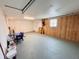 Spacious garage featuring painted walls and a large window at 6046 7Th Ave, New Port Richey, FL 34653