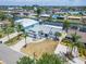 Desirable waterfront property with mature palm trees and picturesque neighborhood canals at 743 Kingston Ct, Apollo Beach, FL 33572