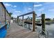 Private dock features a boat lift, providing direct access to picturesque waterways at 743 Kingston Ct, Apollo Beach, FL 33572