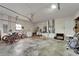 Spacious garage with visible laundry machines, bicycles and sundry storage items at 743 Kingston Ct, Apollo Beach, FL 33572