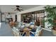 Relaxing patio seating area complete with a ceiling fan is the perfect retreat at 743 Kingston Ct, Apollo Beach, FL 33572