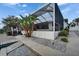 An inviting screened patio area with a tropical plant in the garden, perfect for outdoor relaxation and entertaining at 743 Kingston Ct, Apollo Beach, FL 33572