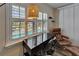 Bright workstation by the window with pool view, blinds, and contemporary chair at 743 Kingston Ct, Apollo Beach, FL 33572