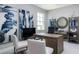 Home office featuring a large desk and bookshelves, perfect for a productive work environment at 7625 Highgrove Ave, Bradenton, FL 34210
