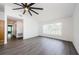 Comfortable living room with lots of light, stylish flooring, and ceiling fan at 7763 Jenner Ave, New Port Richey, FL 34655
