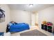Neutral bedroom with tile floors offering versatile options for a bed, decor, and playing at 916 Shangri La Dr, Seffner, FL 33584