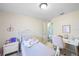 Comfortable bedroom featuring a desk, bed, and neutral walls, creating a welcoming space at 916 Shangri La Dr, Seffner, FL 33584