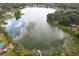 A serene lake view enhances the neighborhood, creating a calming backdrop for the community at 916 Shangri La Dr, Seffner, FL 33584