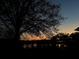 Beautiful dusk water view, showcasing the tranquil backyard at 916 Shangri La Dr, Seffner, FL 33584