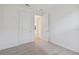 Bedroom features neutral carpet and an open doorway at 9474 Shorebird Ct, Parrish, FL 34219