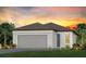 Charming single-story home with a gray exterior, two-car garage, and a well-manicured lawn under a vibrant sunset at 9474 Shorebird Ct, Parrish, FL 34219