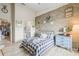 Well-decorated bedroom featuring decorative touches and ample natural light at 10203 Courtney Palms Blvd # 301, Tampa, FL 33619