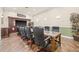 Spacious conference room with large table, comfortable seating, and a modern entertainment center at 10203 Courtney Palms Blvd # 301, Tampa, FL 33619