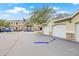 View of detached garage with white door at 10203 Courtney Palms Blvd # 301, Tampa, FL 33619