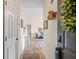 Inviting hallway with view into the living room at 10203 Courtney Palms Blvd # 301, Tampa, FL 33619