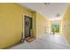 Welcoming hallway featuring neutral tones and ample lighting at 10203 Courtney Palms Blvd # 301, Tampa, FL 33619