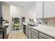 Modern kitchen with sleek appliances and easy access to the eat-in dining space at 10203 Courtney Palms Blvd # 301, Tampa, FL 33619