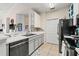 Kitchen featuring stainless steel appliances and neutral finishes at 10203 Courtney Palms Blvd # 301, Tampa, FL 33619