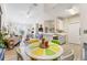 Open-concept living space with a modern kitchen and dining area, perfect for entertaining at 10203 Courtney Palms Blvd # 301, Tampa, FL 33619