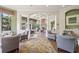 Lobby area with comfortable seating and stylish decor at 10203 Courtney Palms Blvd # 301, Tampa, FL 33619