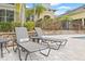 Lounge chairs on the pool deck, perfect for relaxing at 10203 Courtney Palms Blvd # 301, Tampa, FL 33619