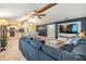 Open floor plan connecting the living area with the kitchen and dining spaces at 1041 Forest Grove Blvd, Palm Harbor, FL 34683