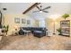 Inviting living room with a comfortable seating arrangement and natural light at 1041 Forest Grove Blvd, Palm Harbor, FL 34683