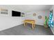 Bonus room with foosball table, TV and nautical themed decor at 10710 Donbrese Ave, Tampa, FL 33615