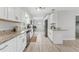 Well-lit kitchen with granite countertops and stainless steel appliances at 10710 Donbrese Ave, Tampa, FL 33615