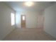 Bright bedroom with large window and neutral carpet at 10928 Carlton Fields Dr, Riverview, FL 33579