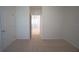 Bedroom featuring neutral carpet and white walls and trim at 10928 Carlton Fields Dr, Riverview, FL 33579