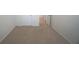 Bright bedroom with neutral carpet and white trim throughout at 10928 Carlton Fields Dr, Riverview, FL 33579