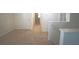 Hallway with neutral carpet, white walls and trim at 10928 Carlton Fields Dr, Riverview, FL 33579