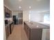 Modern kitchen with stainless steel appliances, granite countertops, and stylish cabinets at 10928 Carlton Fields Dr, Riverview, FL 33579