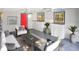 Bright sun room features comfortable seating, blue floors and lots of natural light at 1111 Briarwood Rd, Brandon, FL 33511