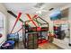 Bright bedroom features modern accents, playful designs, and a stylish loft bed, creating an imaginative and functional space at 11849 Cedarfield Dr, Riverview, FL 33579