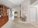 Open floor plan featuring a large built-in cabinet and view of the bathroom at 12125 71St Way, Largo, FL 33773