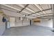 Spacious garage with ample storage, lighting, and a water heater at 1410 Monte Lake Dr, Valrico, FL 33596