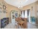 Charming wet bar with seating and decorative shelving, ideal for entertaining guests at 1410 Monte Lake Dr, Valrico, FL 33596