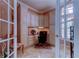 Inviting home office featuring custom cabinetry, workspace, and natural light from the windows at 15302 Lake Maurine Dr, Odessa, FL 33556